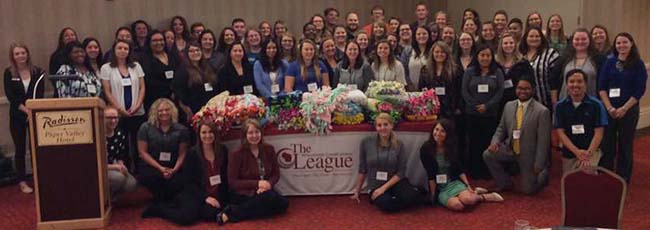 Young Professionals made a pile of blankets for their service project Young Professionals made a pile of blankets for their service project